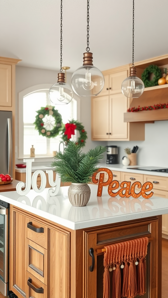 Kitchen island decorated with holiday signs that read 'Joy' and 'Peace', green plant, and festive decor.